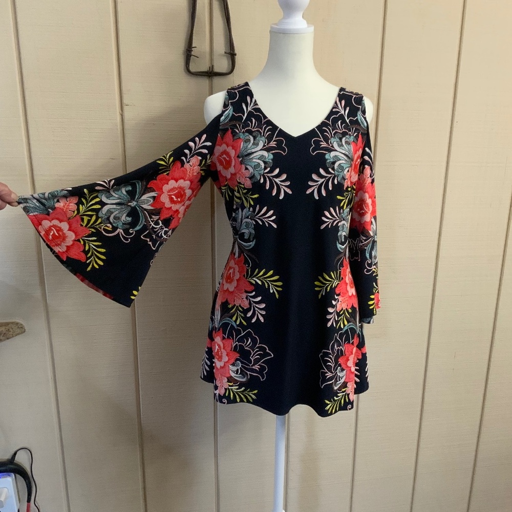 Very cute open shoulder bell sleeved blouse